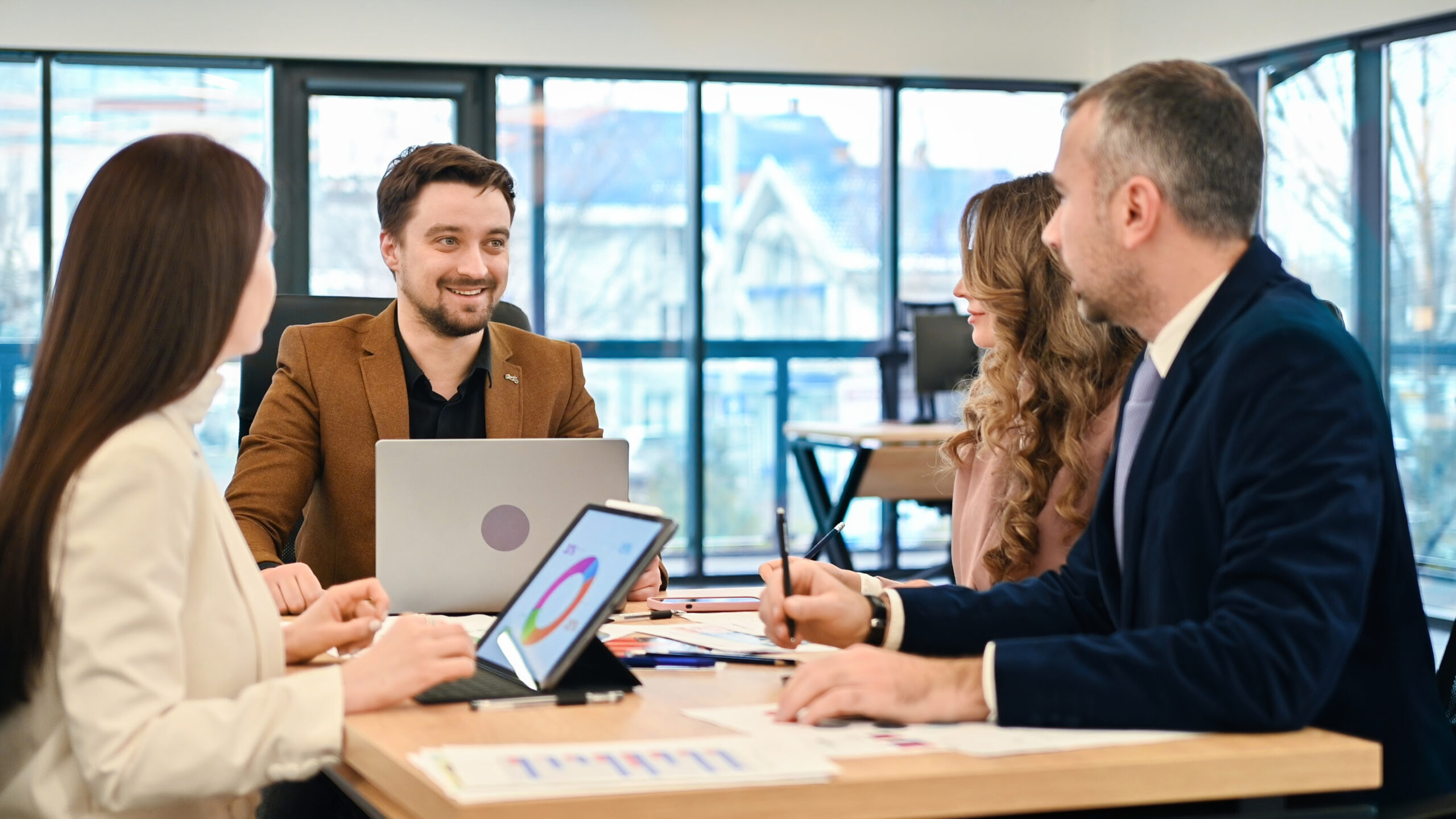 Professionals meeting to discuss business plans in an office